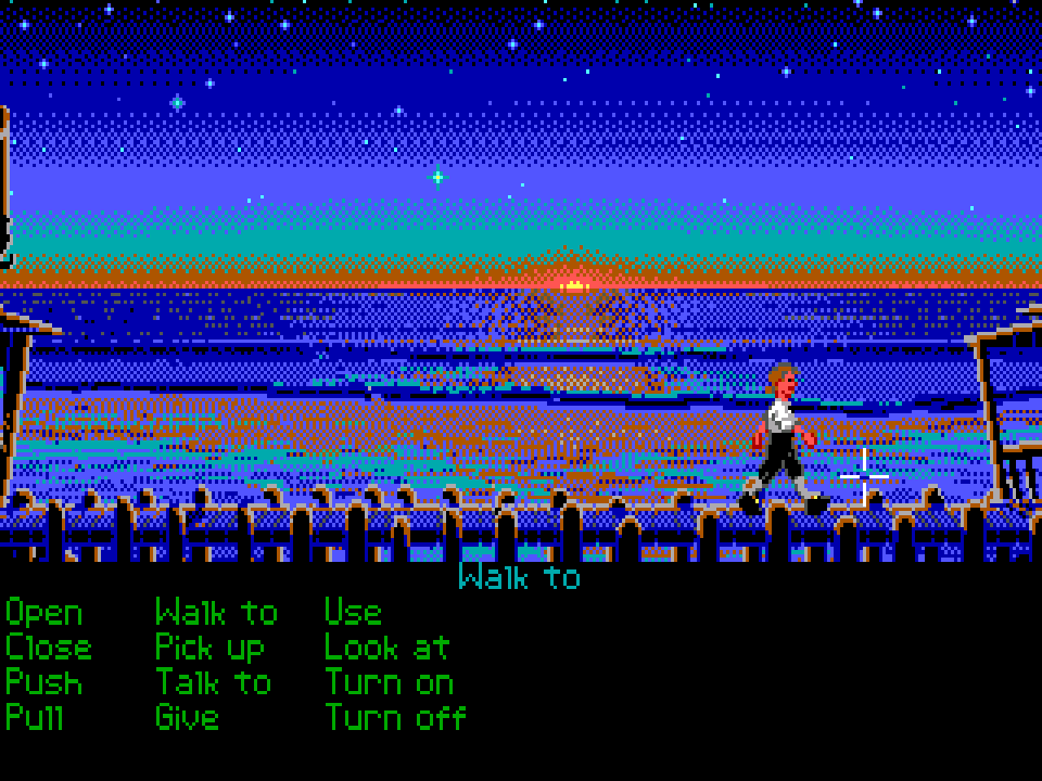 A screenshot of the Secret of Monkey Island game, where Guybrush is walking in the harbor past a sunet. The dithering makes us believe in this sunset with just 16 colors